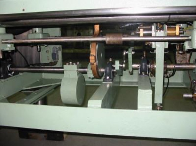 Industrial machinery showcasing a complex arrangement of gears and belts